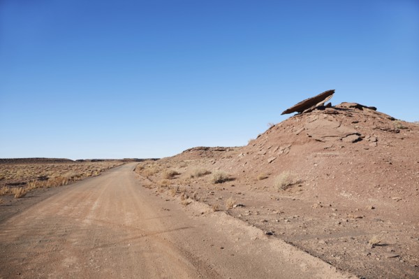 USA, Arizona, Empty road through desert landscape