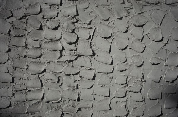 Textured grey cement wall