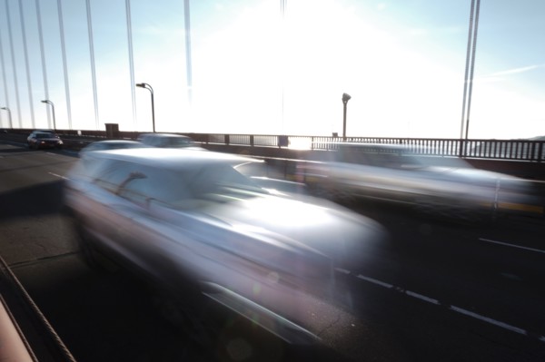 USA, California, San Francisco, Golden Gate Bridge, Cars in blurred motion