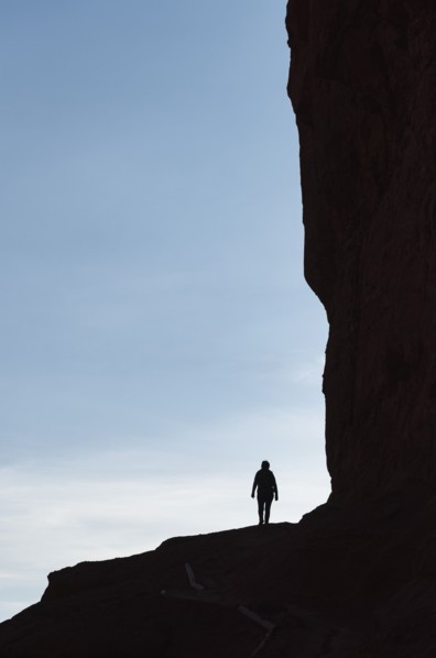 Woman's silhouette by Fisher Towers in Utah, USA