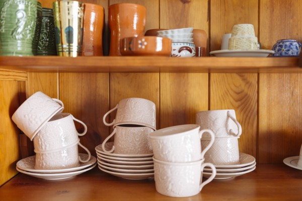 Tableware on wooden shelves