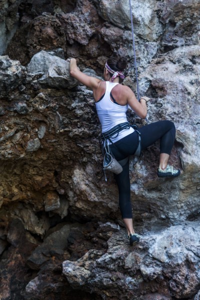 Woman rock climbing