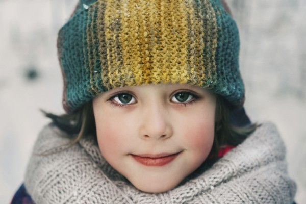 Girl in woollen hat during winter