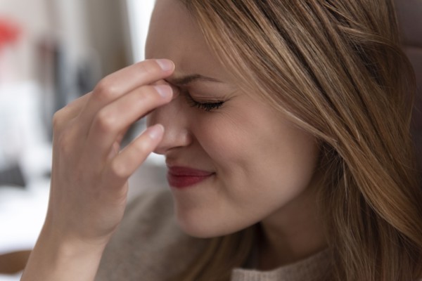 Young woman with headache