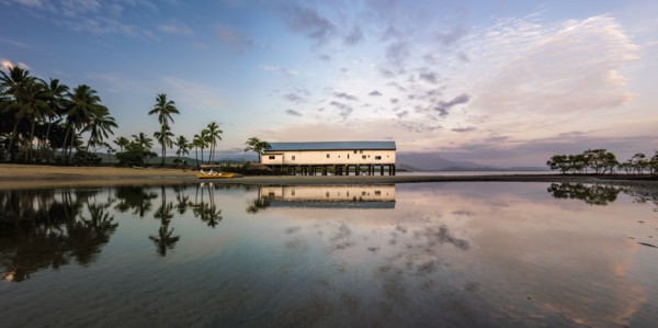 Building by beach at sunset in Port Douglas, Australia