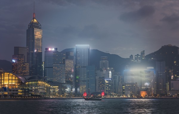 City skyline at sunset in Hong Kong, China