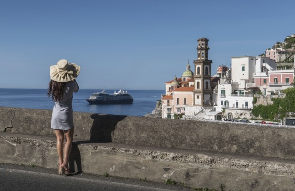 Woman wearing hat by Atrani, Italy