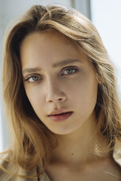 Portrait of young woman wearing natural make-up