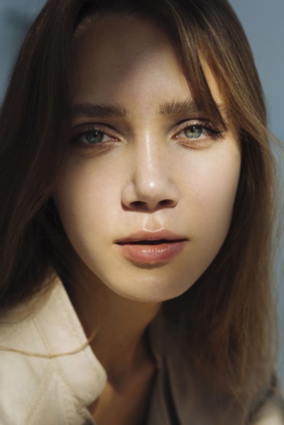 Portrait of young woman wearing natural make-up