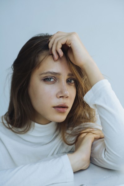 Portrait of young woman wearing natural make-up