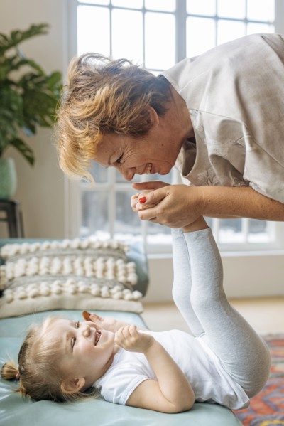 Grandmother playing with granddaughter