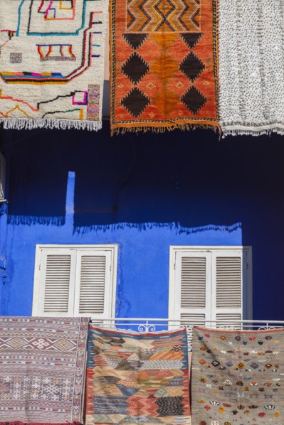 Rugs hanging from balconies in Marrakesh, Morocco