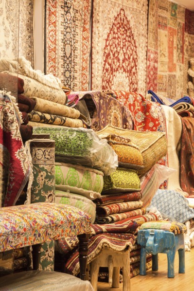 Rugs and cushions at market in Manama, Bahrain