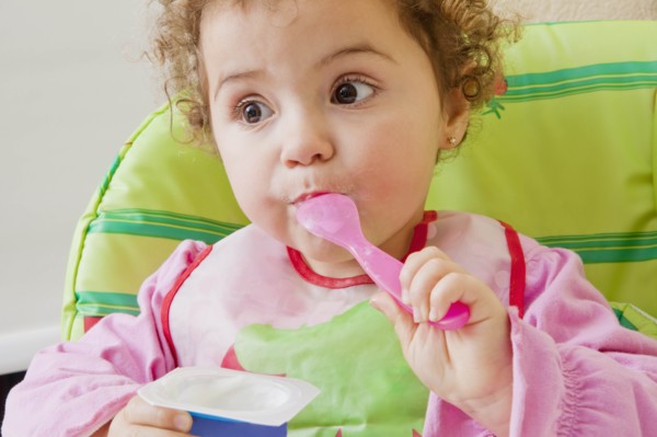 Girl eating yoghurt