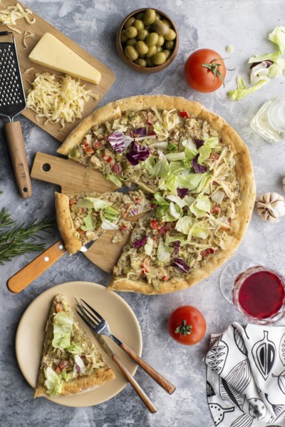 Pizza topped with cabbage
