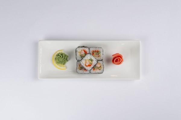 Plate of sushi with pickled ginger and wasabi