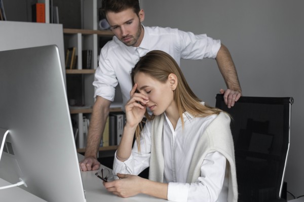Upset businesswoman and sympathetic colleague