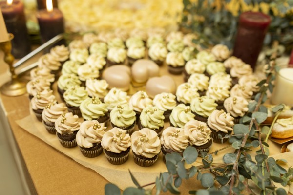 Green and pink cupcakes in circle
