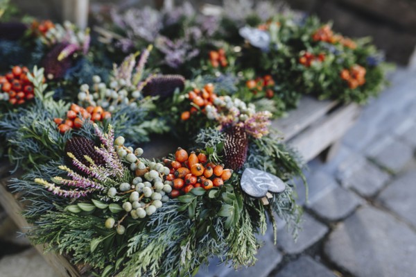 Christmas wreaths on pallet