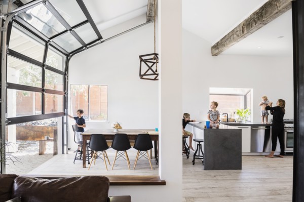 Mother and children in kitchen and dining room