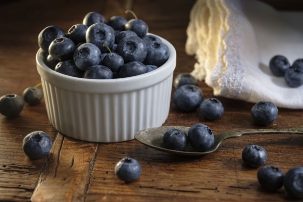 Ramekin of blueberries with spoon