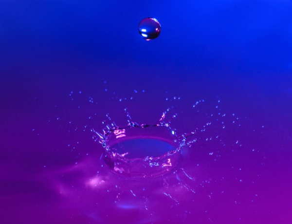 Purple and blue splashing water