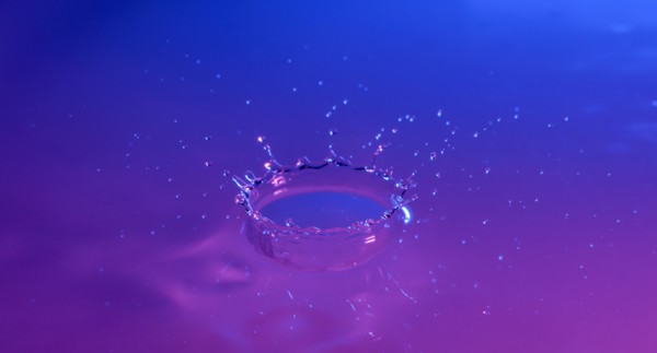 Purple and blue splashing water
