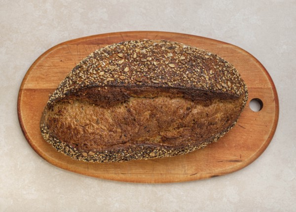 Loaf of bread on cutting board