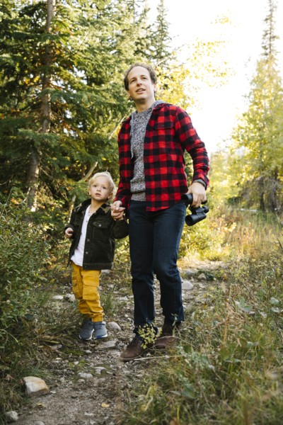 Father and son in forest