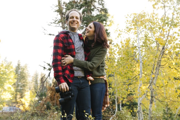 Couple smiling in forest