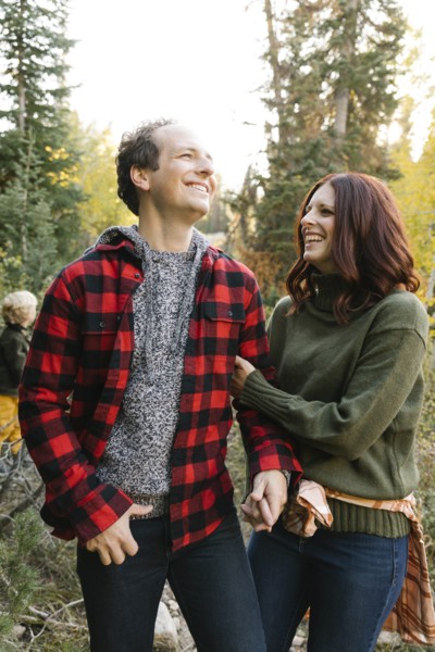 Couple smiling in forest