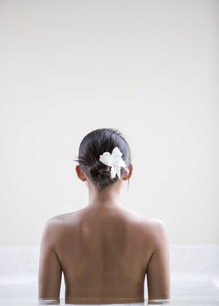 Rear view of woman in spa