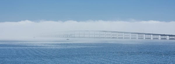 Bridge over sea in fog in Key Biscayne, Florida, USA