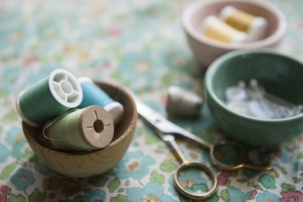 Spools of thread in bowl