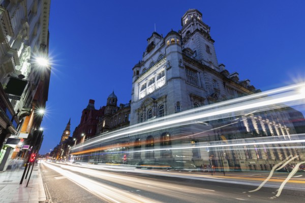 Light trails by building in Liverpool, England