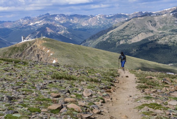 Woman hiking trail on Berthoud Pass Trail in Colorado