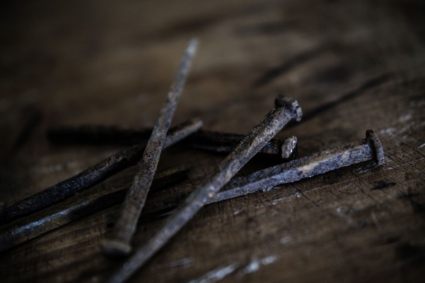 Nails on wooden table