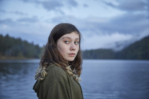 Portrait of girl by lake