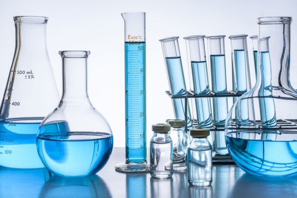 Laboratory glassware with blue liquid