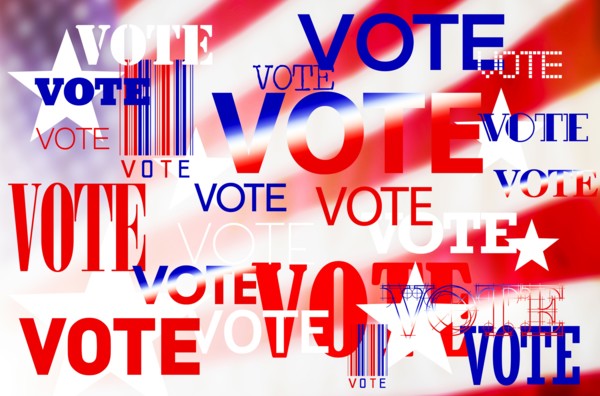 Digitally generated image of American flag and vote signs