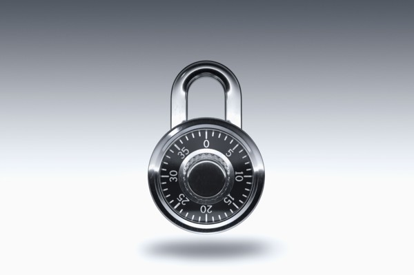 Padlock on gray background