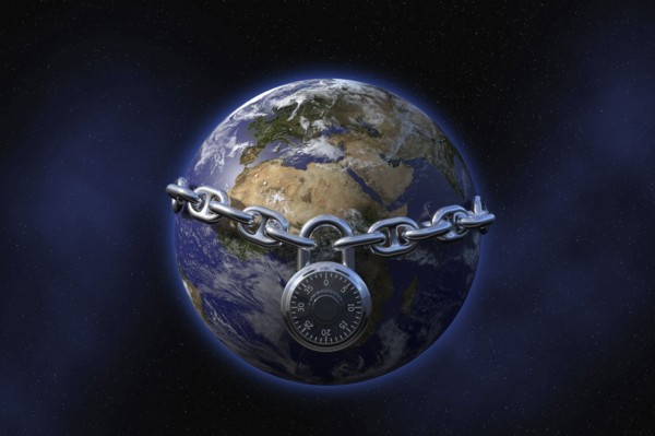 Padlock on chain surrounding globe in space