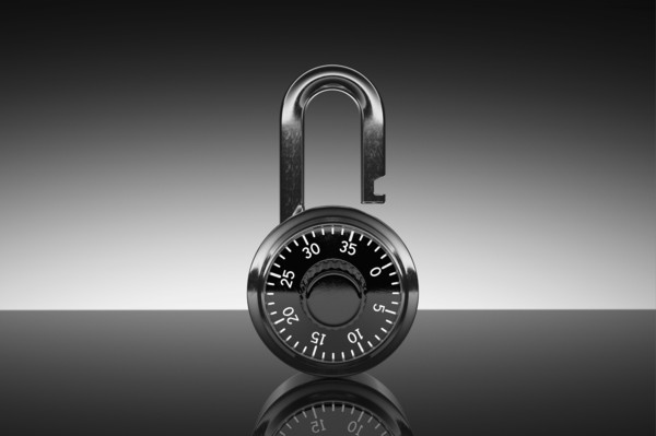 Studio shot of unlocked padlock