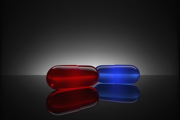 Studio shot of red and blue pills
