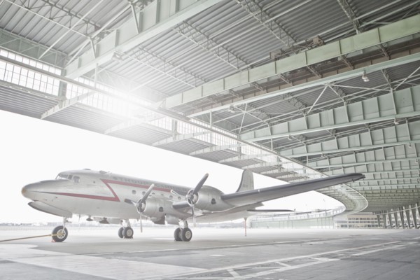 Germany, Berlin, Small airplane in hangar at Tempelhof Airport