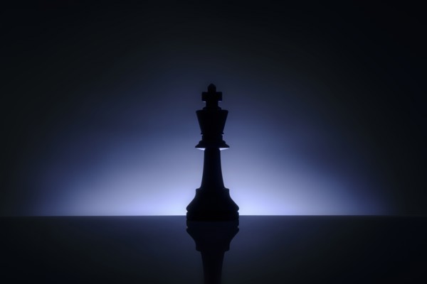 Studio shot of blue chess king