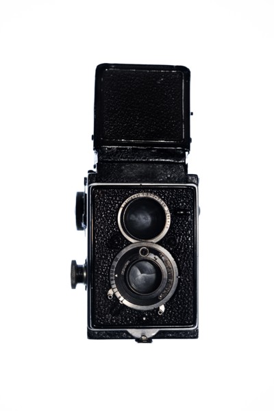 Retro twin lens reflex camera on white