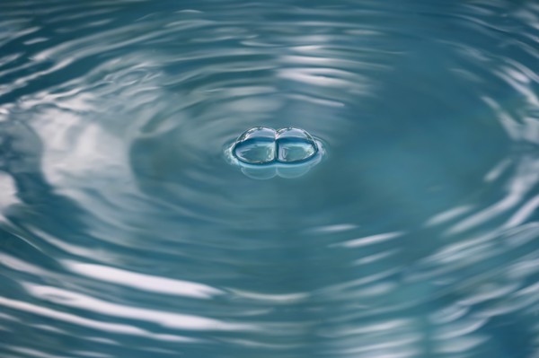 Air bubbles on water surface,,