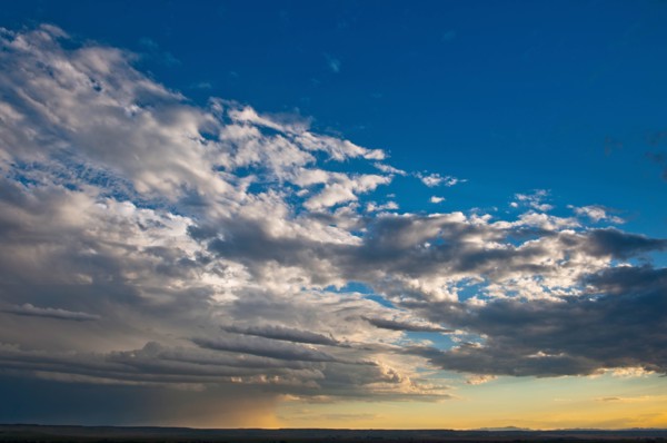 USA, South Dakota, Sunset with parting sun over prairie