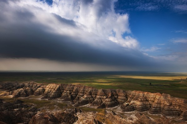 USA, South Dakota, Badlands National Park, Badlands with clearing storm clouds